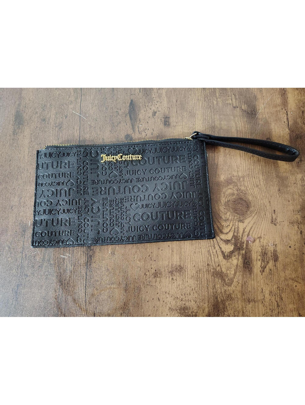 Juicy Couture Black Hand Zip wristlet  embossed monogram pattern 5.5in x 9.5in